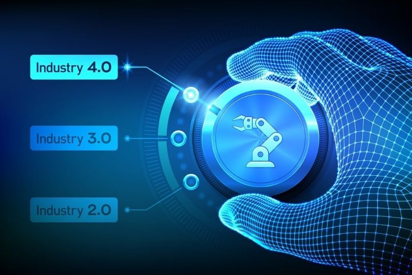 Hand selecting Industry 4.0 on a digital dial
